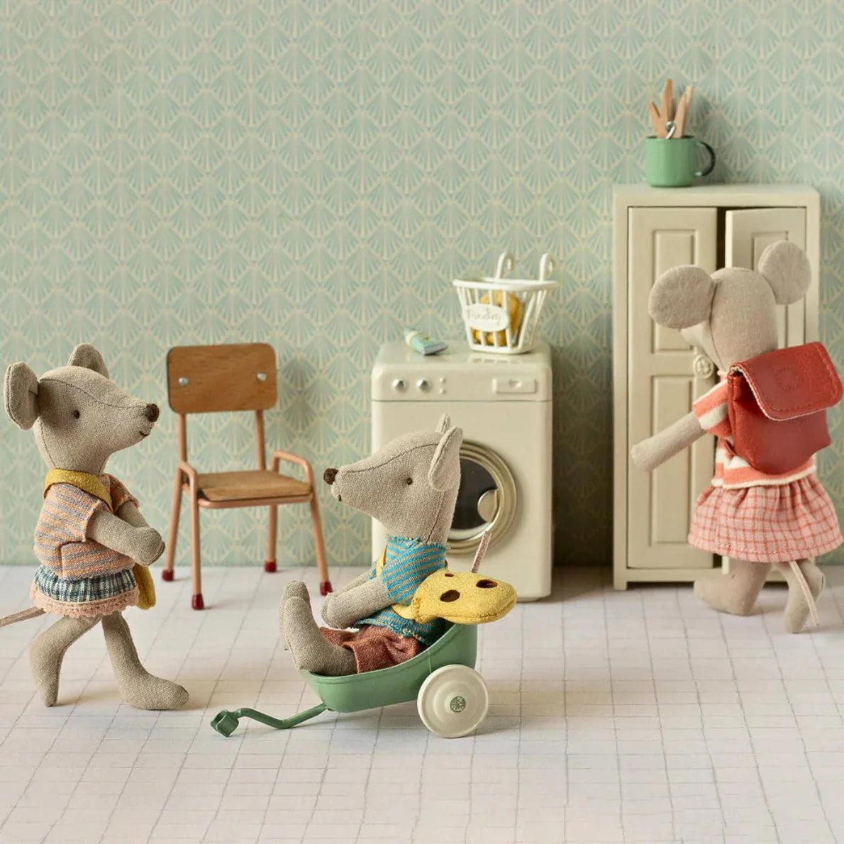 Maileg Mouse Big Sister wearing coral tricycle outfit, featuring detailed clothing and accessories, perfect for Maileg Mice collection.