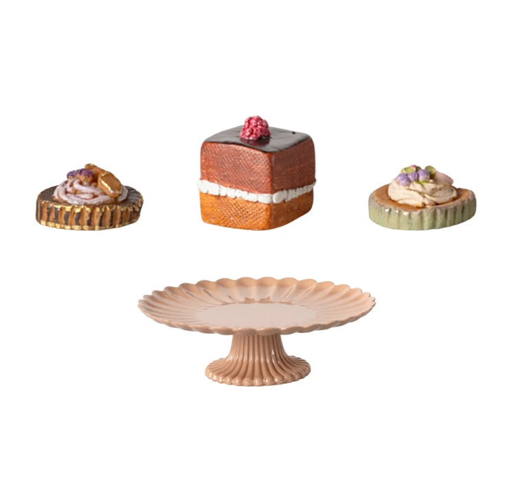 Mini Maileg cakes on a decorative cakestand, perfect for play or display, featuring detailed clay cake replicas.