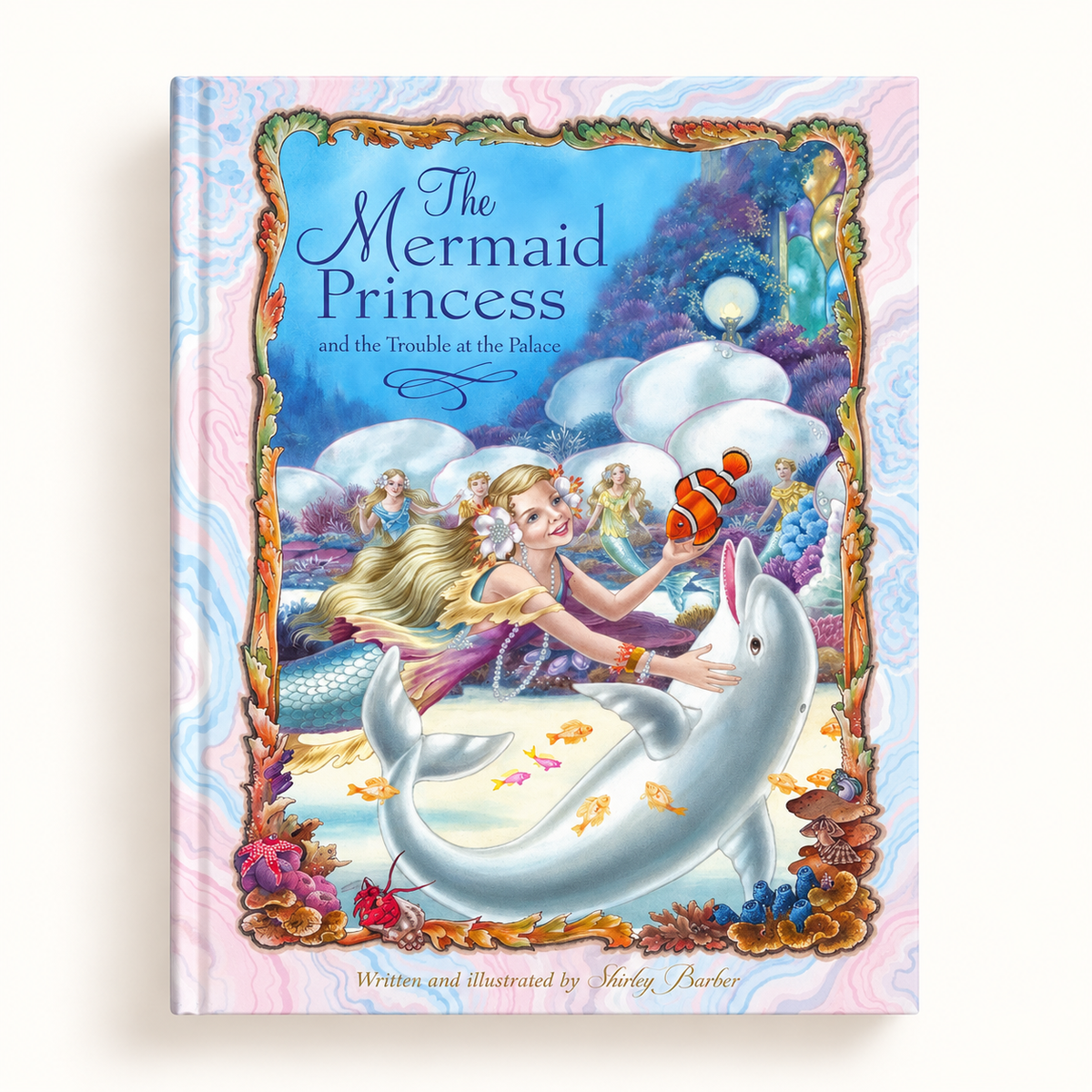 Hardback book titled "The Mermaid Princess and the Trouble at the Palace" by Shirley Barber, featuring an illustrated mermaid undersea scene.