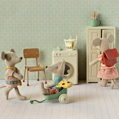 Maileg Mouse Big Sister wearing coral tricycle outfit, featuring detailed clothing and accessories, perfect for Maileg Mice collection.